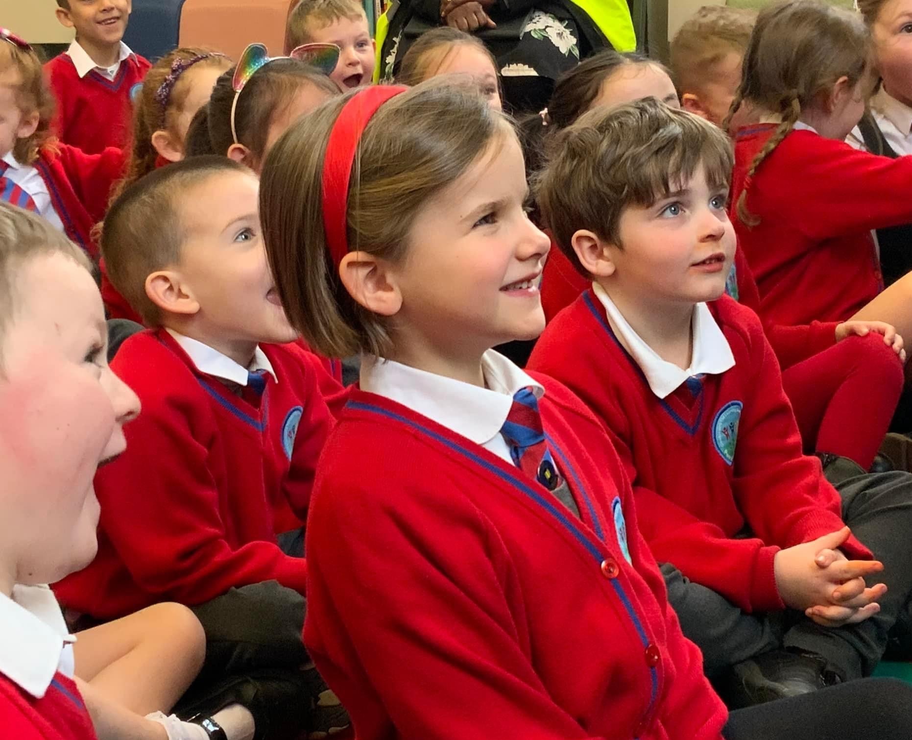 Image of primary school pupils sat down